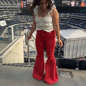 Worn once! Free people flares. High waisted, raw hem, stretchy denim.